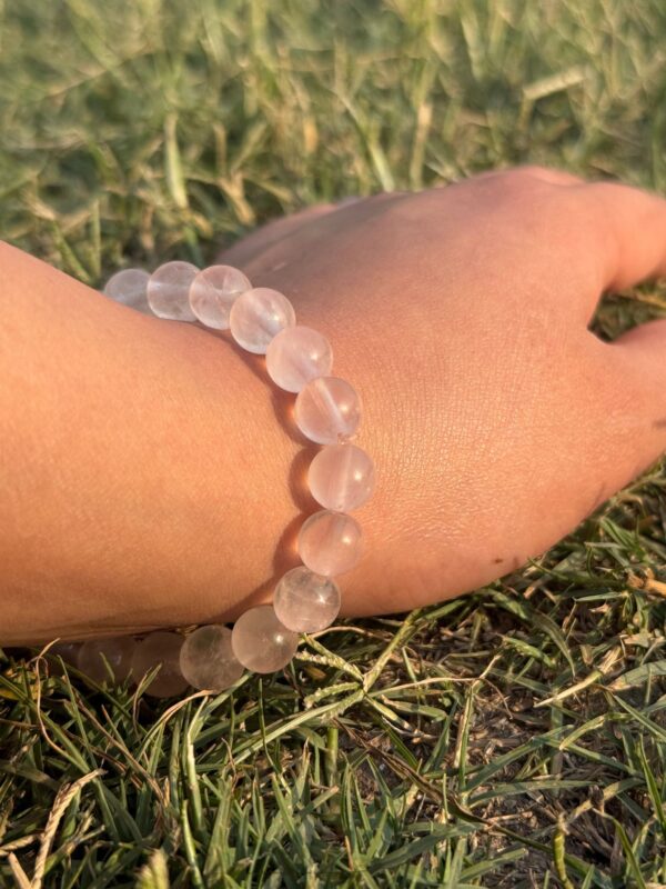 light rose quartz natural gem stone bracelet side view