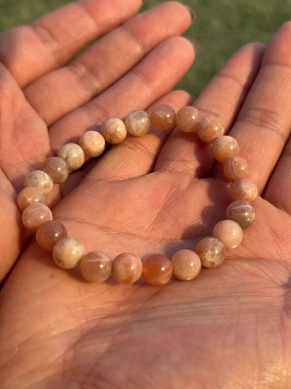 picture stone natural gem stone bracelet in hand
