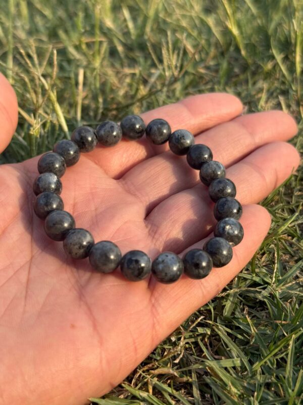 polar zade natural gem stone bracelet in hand