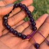 purple agate natural gem stone bracelet in hand