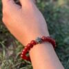 red carnelian natural gemstone bracelet with guru bead left view