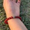 red carnelian natural gemstone bracelet with guru bead top left view