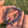 sodalite natural gemstone bracelet in hand