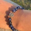 sodalite natural gem stone bracelet with guru bead in hand