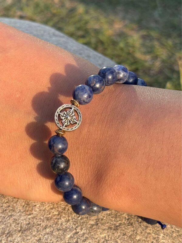 sodalite natural gem stone bracelet with guru bead in hand