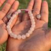 sun stone natural gem stone bracelet in hand