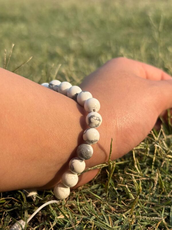 white howlite natural gemstone bracelet in left hand side view