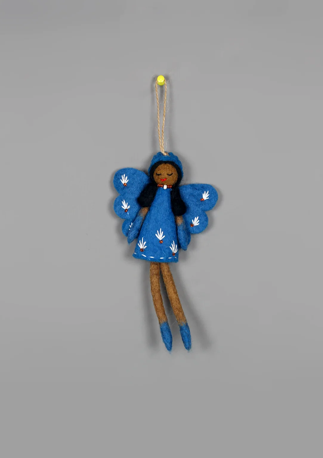 Handmade necklace and earrings created with small felt balls